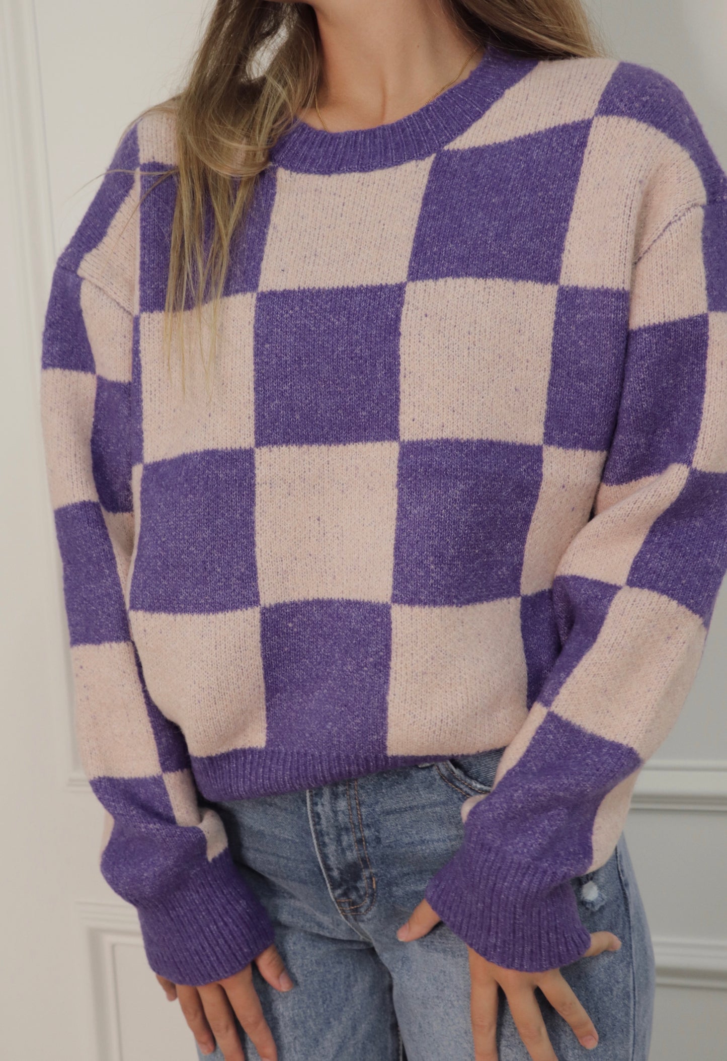 purple checkered sweater