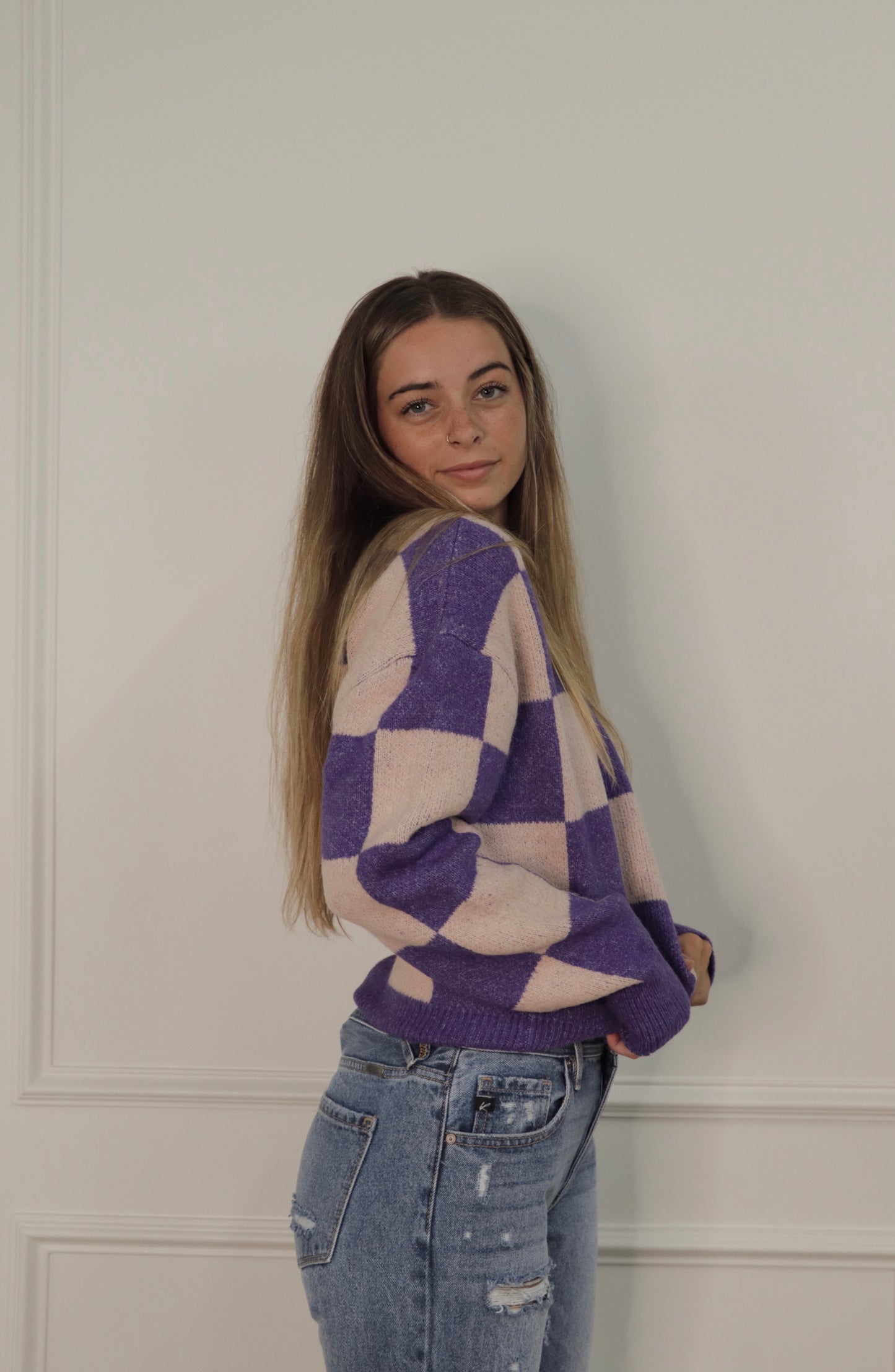 purple checkered sweater